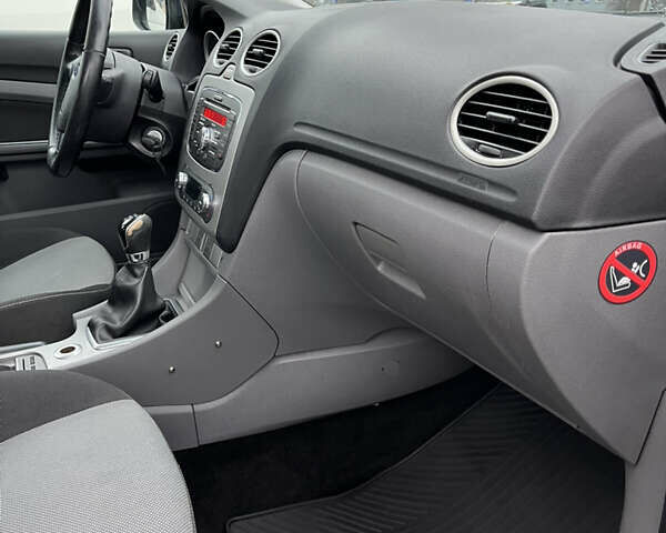 Синий Форд Фокус, объемом двигателя 1.8 л и пробегом 312 тыс. км за 5200 $, фото 15 на Automoto.ua