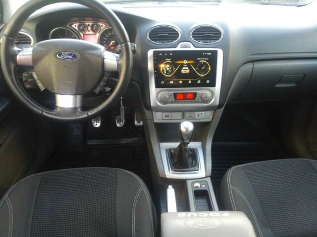 Синий Форд Фокус, объемом двигателя 1.6 л и пробегом 283 тыс. км за 5461 $, фото 11 на Automoto.ua