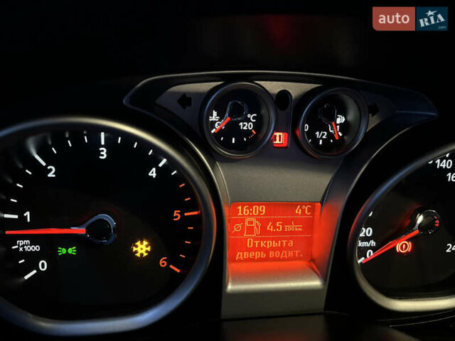 Синій Форд Фокус, об'ємом двигуна 1.56 л та пробігом 241 тис. км за 6599 $, фото 14 на Automoto.ua