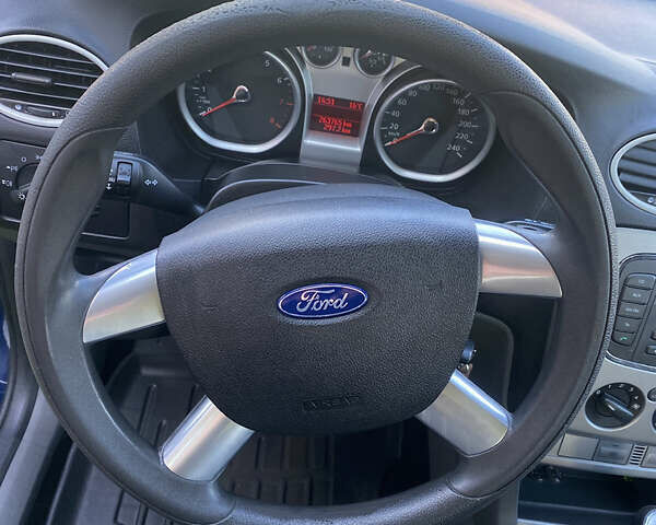 Синій Форд Фокус, об'ємом двигуна 1.6 л та пробігом 300 тис. км за 5600 $, фото 21 на Automoto.ua