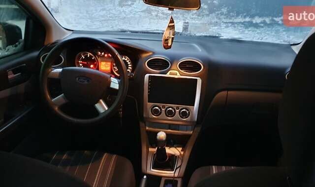 Синій Форд Фокус, об'ємом двигуна 1.6 л та пробігом 267 тис. км за 5300 $, фото 21 на Automoto.ua