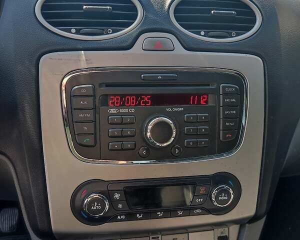 Синій Форд Фокус, об'ємом двигуна 1.56 л та пробігом 251 тис. км за 5300 $, фото 12 на Automoto.ua