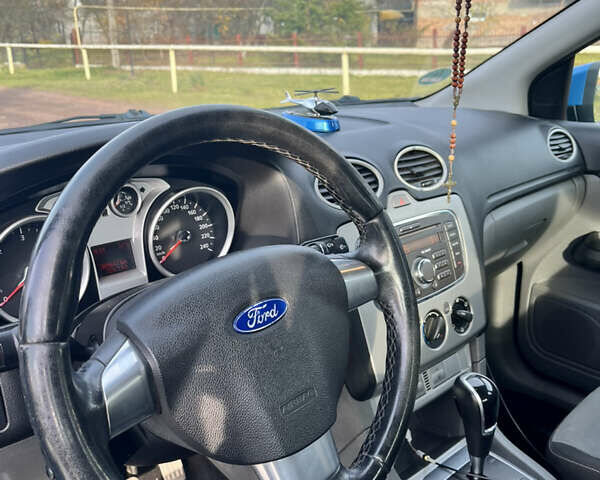 Синій Форд Фокус, об'ємом двигуна 2 л та пробігом 309 тис. км за 6800 $, фото 17 на Automoto.ua