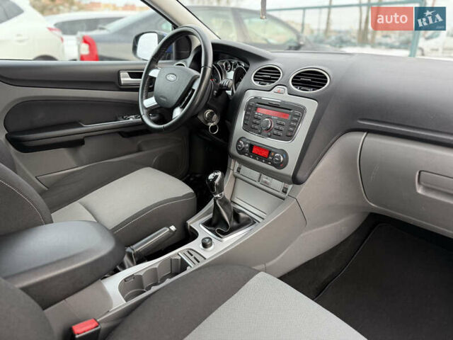 Синий Форд Фокус, объемом двигателя 1.8 л и пробегом 116 тыс. км за 7499 $, фото 12 на Automoto.ua