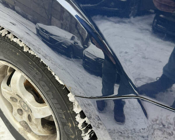 Синий Форд Фокус, объемом двигателя 1.6 л и пробегом 285 тыс. км за 5250 $, фото 6 на Automoto.ua