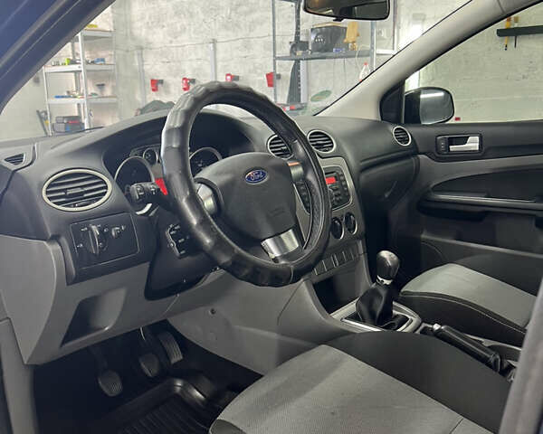 Синій Форд Фокус, об'ємом двигуна 1.56 л та пробігом 302 тис. км за 5300 $, фото 4 на Automoto.ua