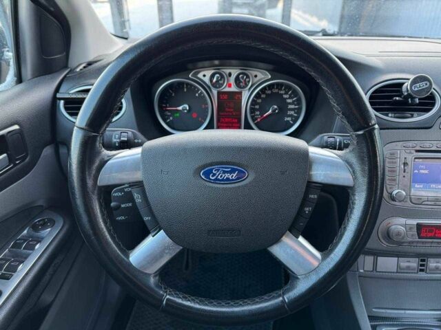 Синій Форд Фокус, об'ємом двигуна 1.6 л та пробігом 244 тис. км за 6790 $, фото 14 на Automoto.ua