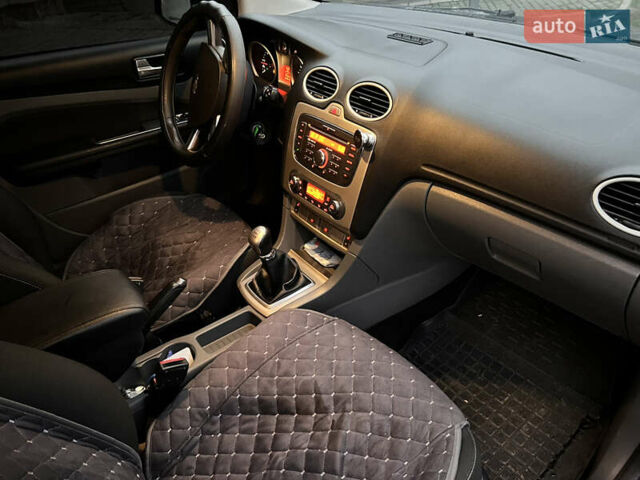 Синій Форд Фокус, об'ємом двигуна 1.56 л та пробігом 241 тис. км за 6599 $, фото 7 на Automoto.ua