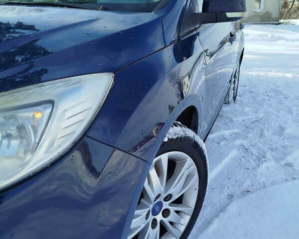 Синій Форд Фокус, об'ємом двигуна 1.56 л та пробігом 279 тис. км за 6350 $, фото 15 на Automoto.ua