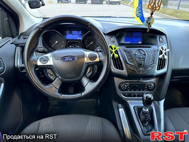 Синий Форд Фокус, объемом двигателя 1.6 л и пробегом 217 тыс. км за 7600 $, фото 11 на Automoto.ua