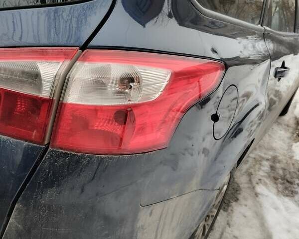Синій Форд Фокус, об'ємом двигуна 1.56 л та пробігом 207 тис. км за 4300 $, фото 22 на Automoto.ua