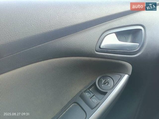Синій Форд Фокус, об'ємом двигуна 1.6 л та пробігом 290 тис. км за 7000 $, фото 11 на Automoto.ua