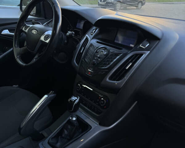 Синій Форд Фокус, об'ємом двигуна 1.6 л та пробігом 240 тис. км за 7900 $, фото 10 на Automoto.ua