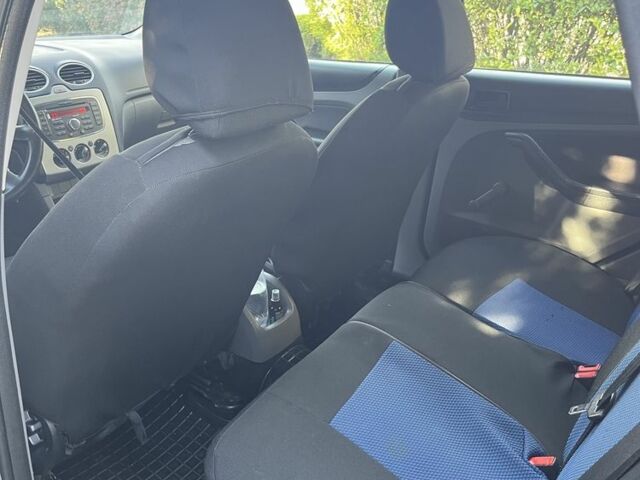 Синій Форд Фокус, об'ємом двигуна 1.4 л та пробігом 234 тис. км за 4900 $, фото 9 на Automoto.ua