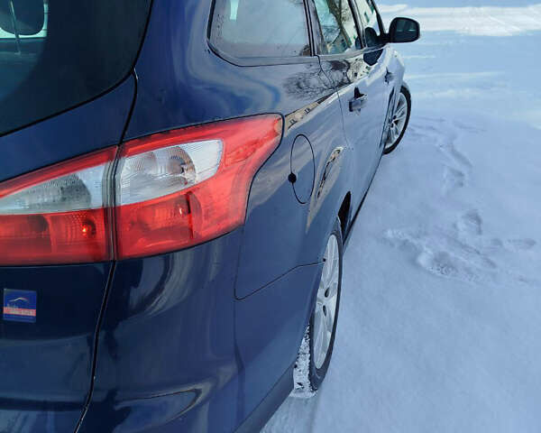 Синій Форд Фокус, об'ємом двигуна 1.56 л та пробігом 279 тис. км за 6350 $, фото 14 на Automoto.ua