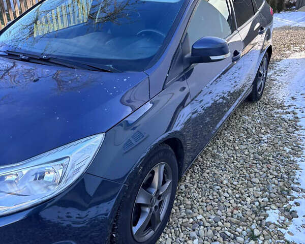 Синий Форд Фокус, объемом двигателя 1.6 л и пробегом 235 тыс. км за 6950 $, фото 2 на Automoto.ua