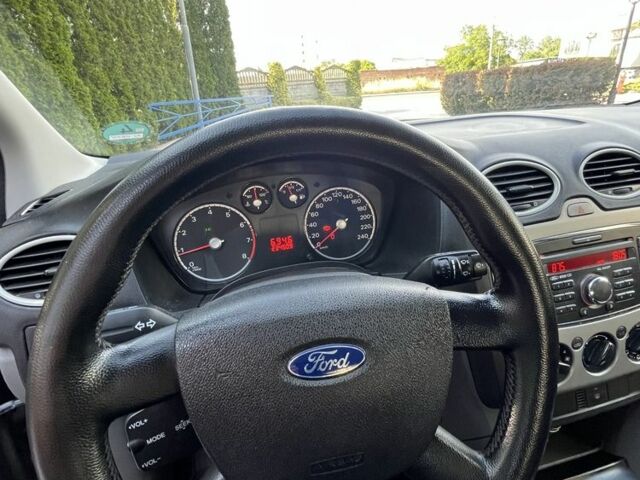Синій Форд Фокус, об'ємом двигуна 1.4 л та пробігом 234 тис. км за 4900 $, фото 13 на Automoto.ua