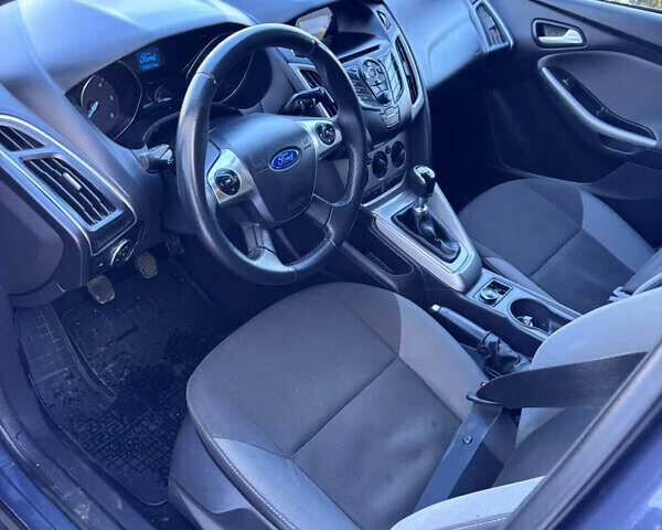 Синий Форд Фокус, объемом двигателя 1.6 л и пробегом 235 тыс. км за 6950 $, фото 9 на Automoto.ua