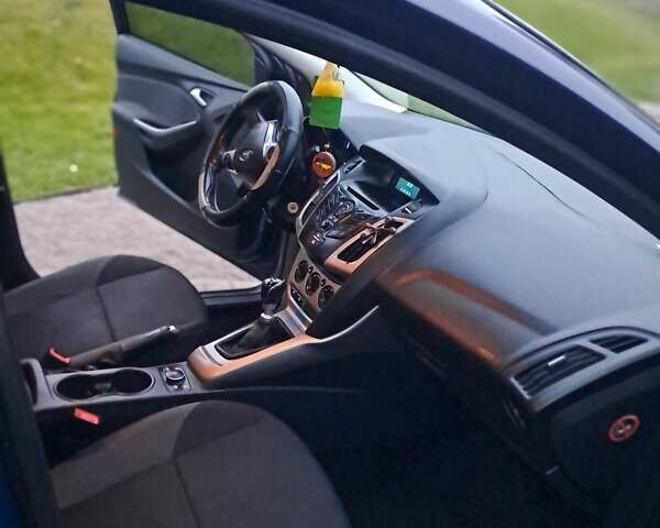 Синій Форд Фокус, об'ємом двигуна 1.6 л та пробігом 295 тис. км за 7800 $, фото 17 на Automoto.ua