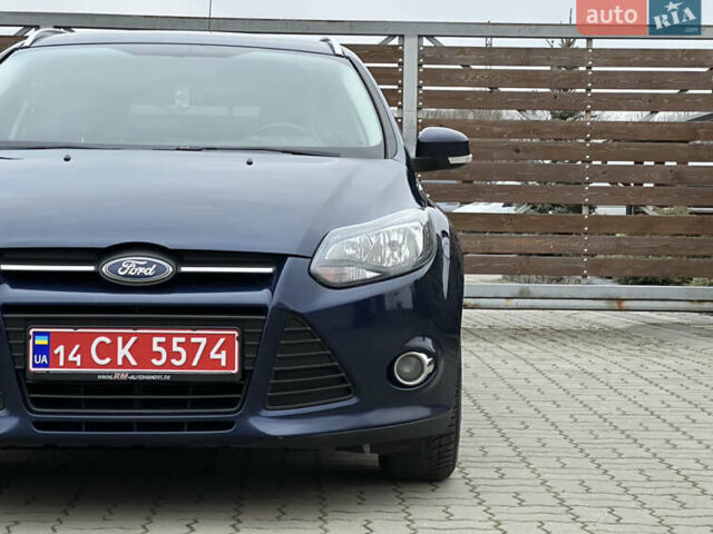 Синій Форд Фокус, об'ємом двигуна 1.6 л та пробігом 235 тис. км за 7699 $, фото 21 на Automoto.ua
