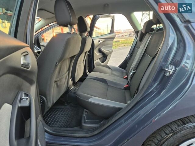 Синій Форд Фокус, об'ємом двигуна 1.56 л та пробігом 205 тис. км за 6300 $, фото 28 на Automoto.ua