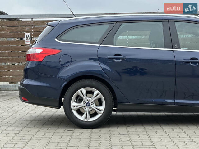Синій Форд Фокус, об'ємом двигуна 1.6 л та пробігом 235 тис. км за 7699 $, фото 17 на Automoto.ua