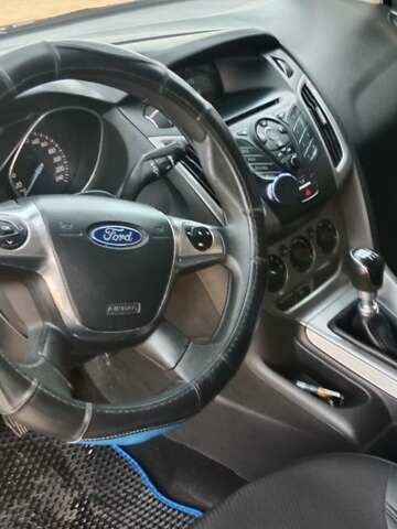 Синий Форд Фокус, объемом двигателя 1.56 л и пробегом 180 тыс. км за 8500 $, фото 5 на Automoto.ua