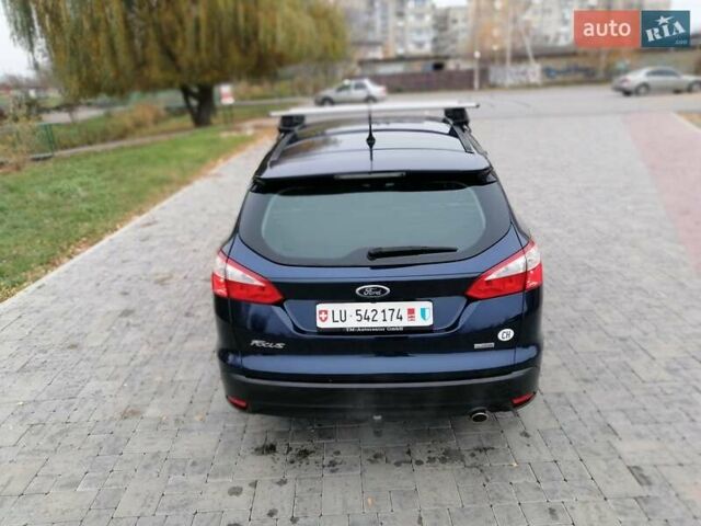Синій Форд Фокус, об'ємом двигуна 1.6 л та пробігом 215 тис. км за 7599 $, фото 5 на Automoto.ua