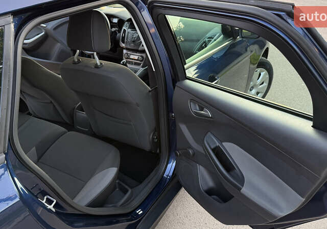 Синий Форд Фокус, объемом двигателя 1.6 л и пробегом 217 тыс. км за 7050 $, фото 13 на Automoto.ua