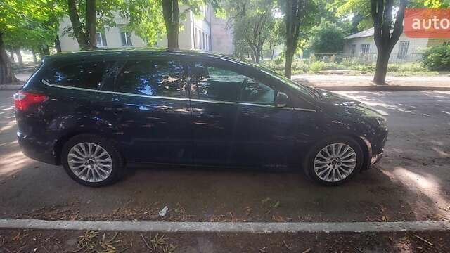 Синій Форд Фокус, об'ємом двигуна 2 л та пробігом 212 тис. км за 7500 $, фото 5 на Automoto.ua