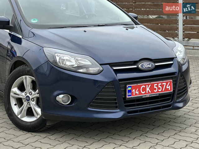 Синій Форд Фокус, об'ємом двигуна 1.6 л та пробігом 235 тис. км за 7699 $, фото 14 на Automoto.ua