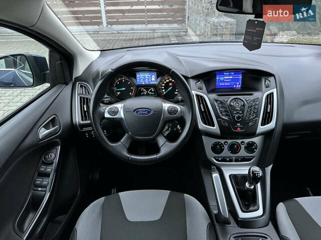 Синій Форд Фокус, об'ємом двигуна 1.6 л та пробігом 235 тис. км за 7699 $, фото 42 на Automoto.ua