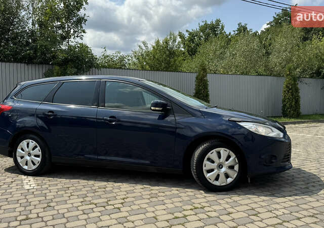 Синій Форд Фокус, об'ємом двигуна 1.6 л та пробігом 236 тис. км за 6450 $, фото 4 на Automoto.ua