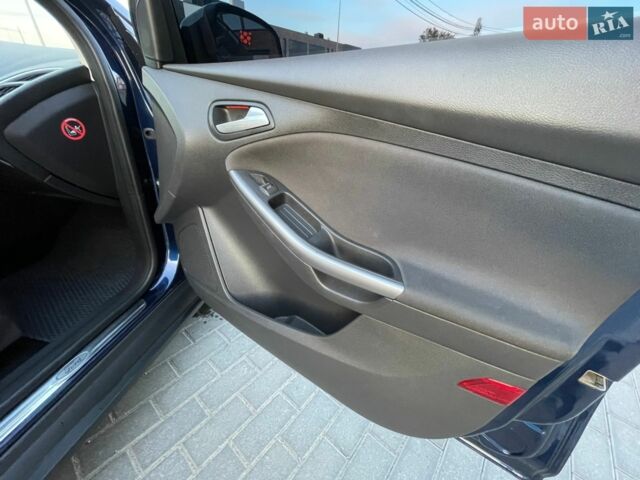 Синій Форд Фокус, об'ємом двигуна 1 л та пробігом 235 тис. км за 4699 $, фото 13 на Automoto.ua