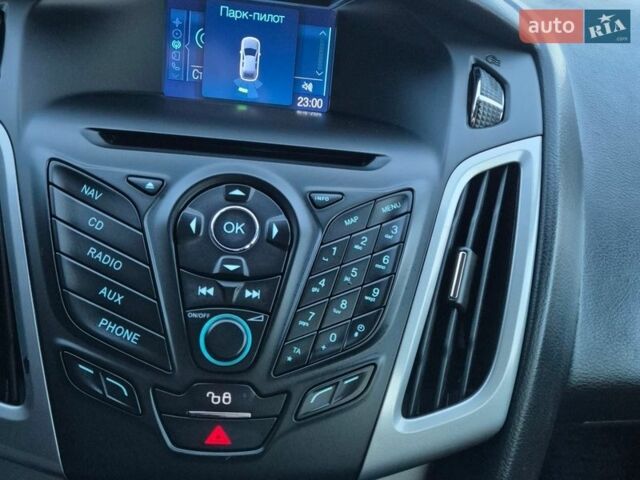 Синій Форд Фокус, об'ємом двигуна 1.56 л та пробігом 205 тис. км за 6300 $, фото 26 на Automoto.ua