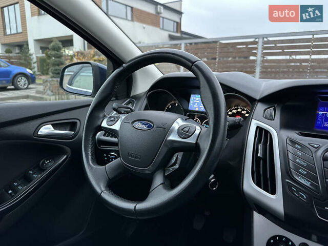 Синій Форд Фокус, об'ємом двигуна 1.6 л та пробігом 235 тис. км за 7699 $, фото 45 на Automoto.ua