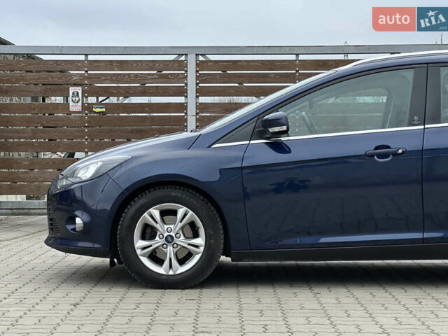 Синій Форд Фокус, об'ємом двигуна 1.6 л та пробігом 235 тис. км за 7699 $, фото 5 на Automoto.ua