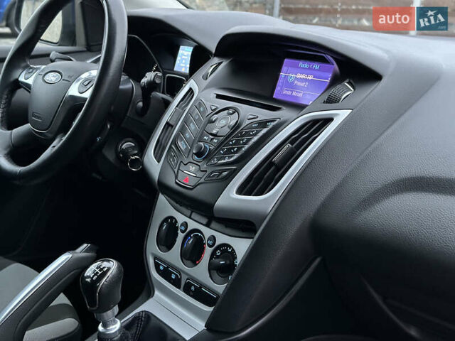 Синій Форд Фокус, об'ємом двигуна 1.6 л та пробігом 235 тис. км за 7699 $, фото 56 на Automoto.ua