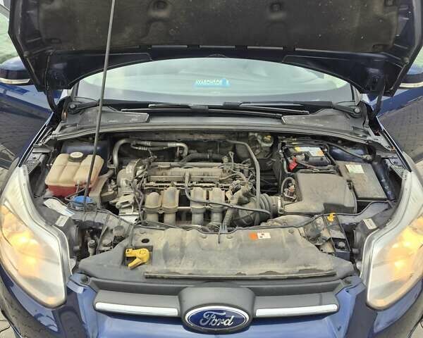 Синий Форд Фокус, объемом двигателя 1.6 л и пробегом 294 тыс. км за 7900 $, фото 21 на Automoto.ua