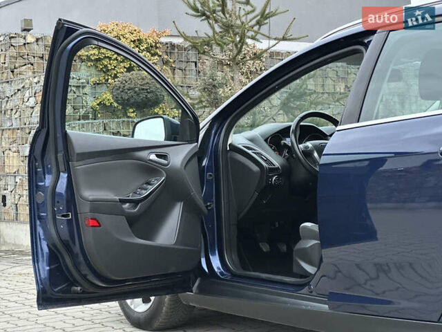 Синій Форд Фокус, об'ємом двигуна 1.6 л та пробігом 235 тис. км за 7699 $, фото 24 на Automoto.ua