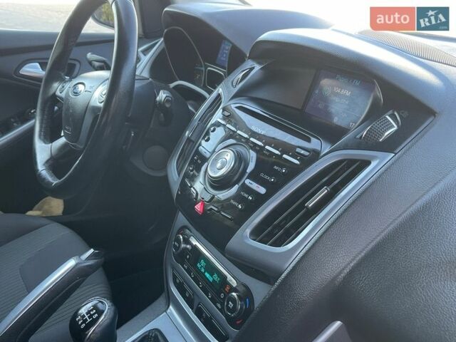 Синий Форд Фокус, объемом двигателя 1.56 л и пробегом 227 тыс. км за 7400 $, фото 28 на Automoto.ua