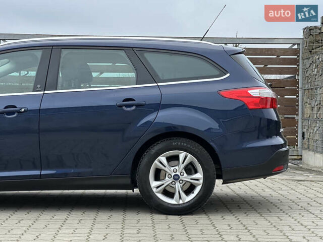 Синій Форд Фокус, об'ємом двигуна 1.6 л та пробігом 235 тис. км за 7699 $, фото 7 на Automoto.ua
