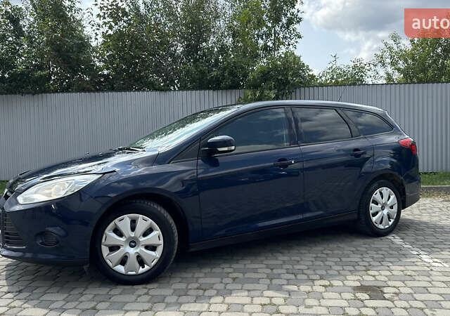 Синій Форд Фокус, об'ємом двигуна 1.6 л та пробігом 236 тис. км за 6450 $, фото 22 на Automoto.ua