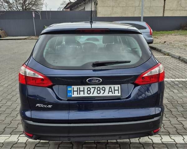Синий Форд Фокус, объемом двигателя 1.6 л и пробегом 294 тыс. км за 7900 $, фото 4 на Automoto.ua
