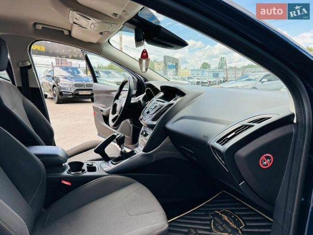 Синій Форд Фокус, об'ємом двигуна 1.56 л та пробігом 264 тис. км за 8900 $, фото 21 на Automoto.ua
