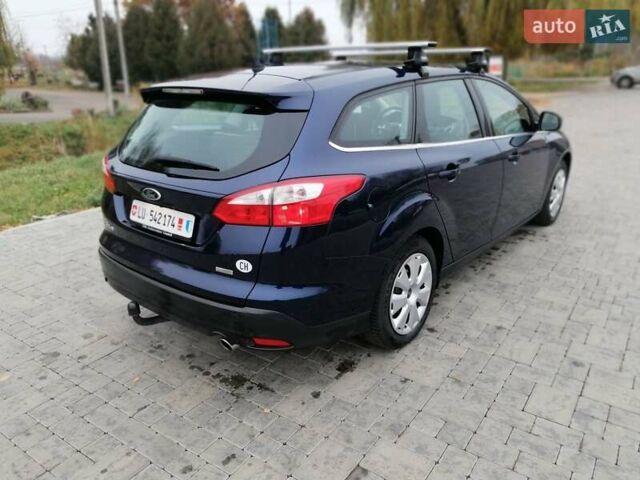 Синій Форд Фокус, об'ємом двигуна 1.6 л та пробігом 215 тис. км за 7599 $, фото 6 на Automoto.ua
