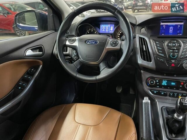 Синій Форд Фокус, об'ємом двигуна 1.6 л та пробігом 229 тис. км за 8900 $, фото 19 на Automoto.ua