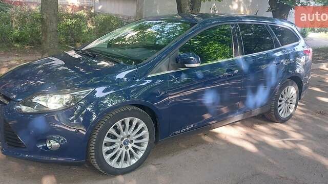 Синій Форд Фокус, об'ємом двигуна 2 л та пробігом 212 тис. км за 7500 $, фото 8 на Automoto.ua