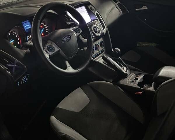 Синій Форд Фокус, об'ємом двигуна 1 л та пробігом 220 тис. км за 6200 $, фото 4 на Automoto.ua