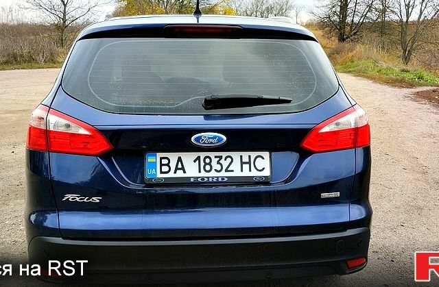 Синий Форд Фокус, объемом двигателя 1.6 л и пробегом 252 тыс. км за 8300 $, фото 2 на Automoto.ua